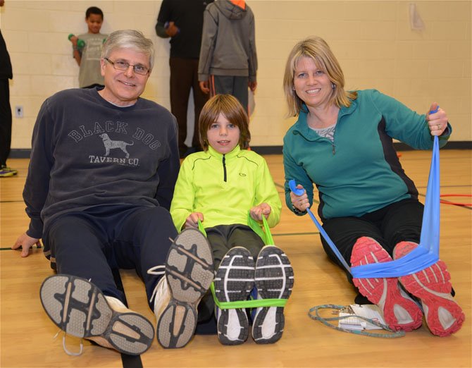 The Melnick family are ready to prove that this was, indeed, Family Fitness Night. Dad John teaches ESL at Lake Anne, son Evan attends in the fourth grade, and mom Lorrie Ann was keeping up her end of the fitness bargain.