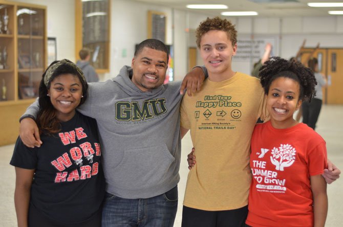 Herndon School Step Team captain Hannah Vaughn, Step coach Gary Bushrod, captain Chris Donald, and captain Sumayya Sulaiman.