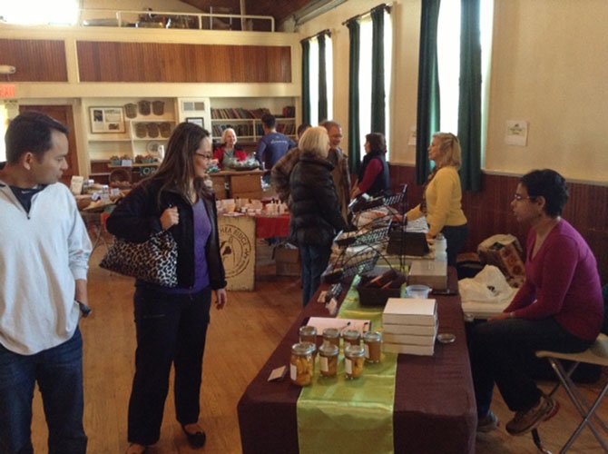 Vendors greet shoppers and explain how they have made or grown their product