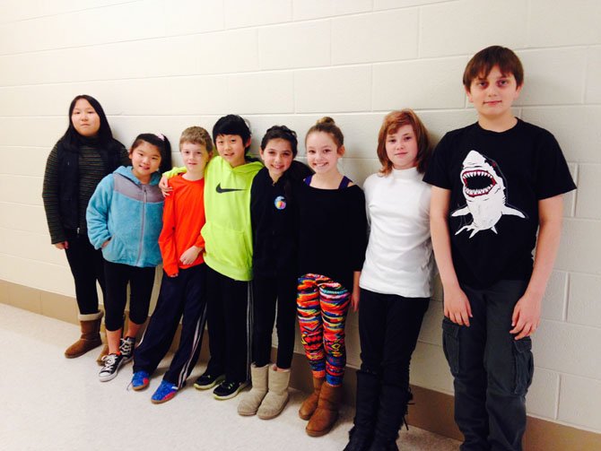 Some of the fifth grade filmmakers pose after the world premiere of their film at Beverly Farms Elementary School.