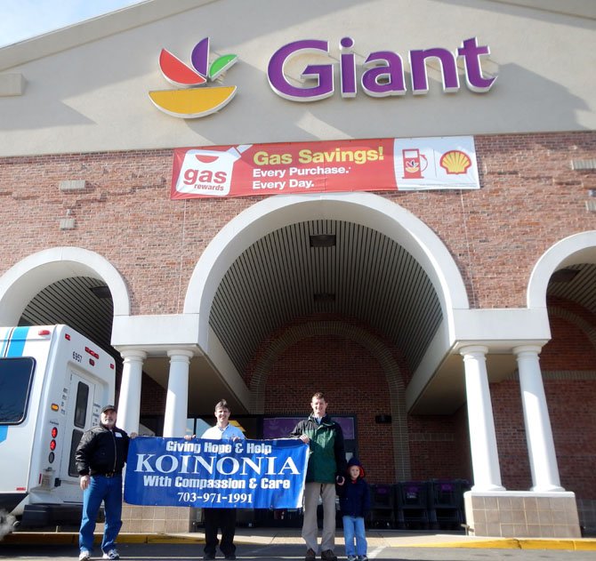 Volunteers participate in the Stuff the Bus campaign on Feb. 17 at the Kingstowne Giant.