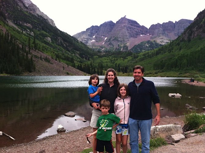 Elizabeth Rees, the associate rector at Saint Aidan’s Episcopal Church in Alexandria, says laughter, forgiveness and gratitude are among the factors that create a harmonious family life. Here she is pictured on a family vacation with her daughter Maya, 3; her husband Holden Hoofnagle; her son Dylan, 7; and daughter Sophia, 10.