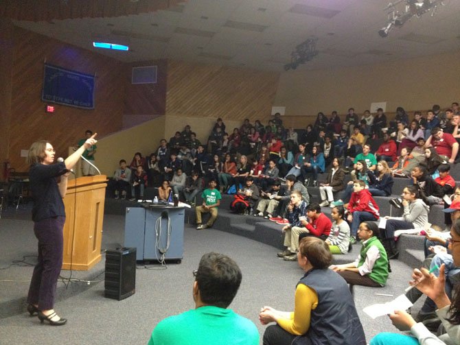 Dr. Roian Egnor shares some of her experiences as a behavioral scientist with the auditorium of about 150 students.