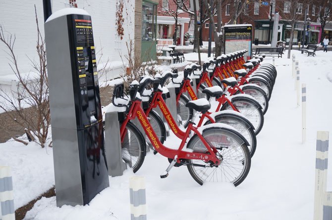 Bicycles sit idle during the storm.