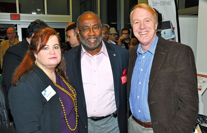 Alexandria Mayor Bill Euille, one of the 11 candidates running for the 8th Congressional District seat in the Democratic primary, is flanked by the Mount Vernon Democratic Committee co-chairs Kate Spears (left) and state Sen. George Barker (D-39) to his right. The straw poll was held at Don Beyer Volvo in Alexandria on Saturday, March 1, and was sponsored by the MVDDC.