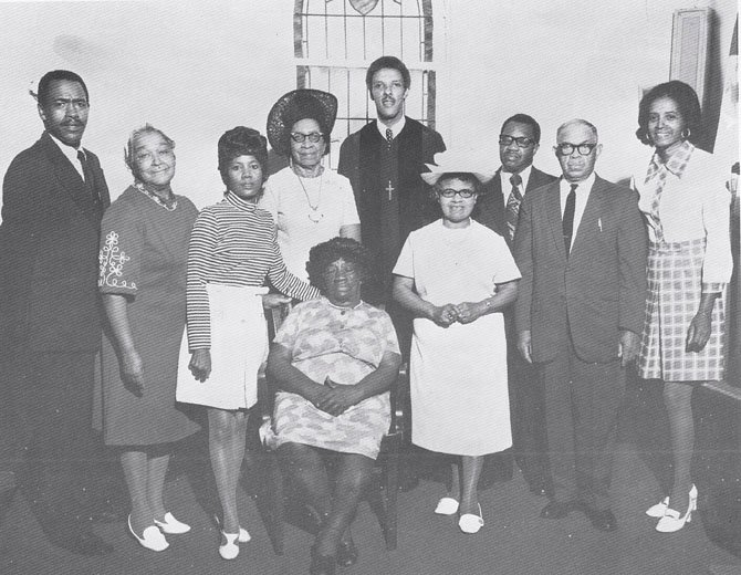 Deloris Evans, pictured on the right, founded the Esther Honesty Scholarship Committee in 1963. The scholarship awarded college funds to young members of Shiloh Baptist Church in McLean. The Scholarship Committee still exists today. The late Pastor Roger V. Bush is pictured in the center back.
