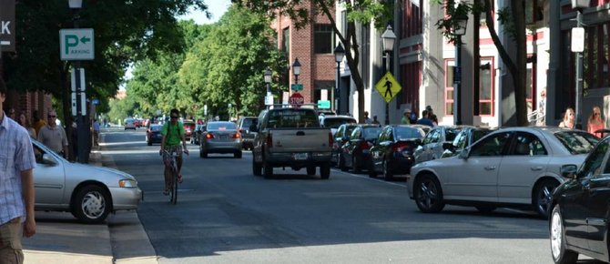 Pedestrians and cyclists mingle with motorists on Union Street, which was identified as a problem during the waterfront planning process.