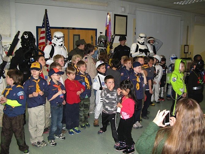 The members and families of Pack 157 enjoyed space-themed evening.