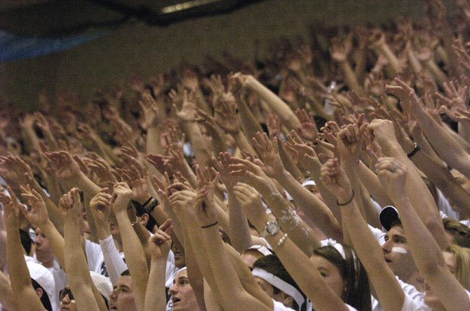 The Woodson student section is seen during the state semifinals against Landstown on March 8 at Robinson Secondary School.