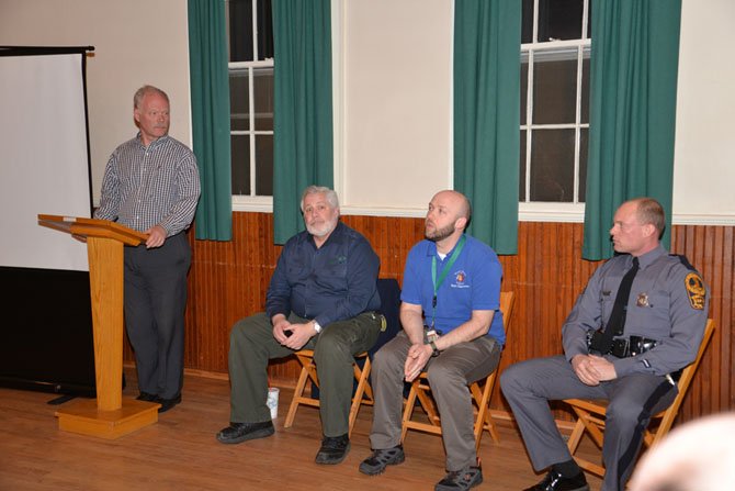 Great Falls Citizens Association Vice President Bill Canis runs the Town Hall Meeting. His panel of expert speakers on topics related to deer management were Jim McGlone with the Virginia Dept. of Forestry, Josh Smith with Fairfax County Dept. of Health, and Virginia State Trooper Hendrick. 