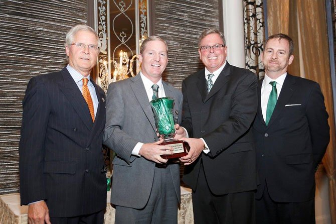 Bradley Cance receives his leadership award from Michigan State University.
