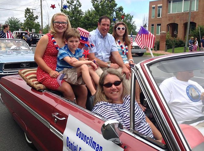 Riding in Fairfax’s Fourth of July parade last year are (back row, from left) family friend Cecelia Szkutak with Liam, Patrick, Dan and Sadie Drummond; front passenger is Kerry Drummond.
