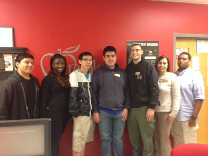 Annandale High School students who work at the student run credit union there, from left to right: Edwin Munoz, Doreen Tetteh, Tony Nguyen, Sergio Martinez, Dominic Maier, Monica Bentley (business teacher and faculty liaison), Issac Kebede.