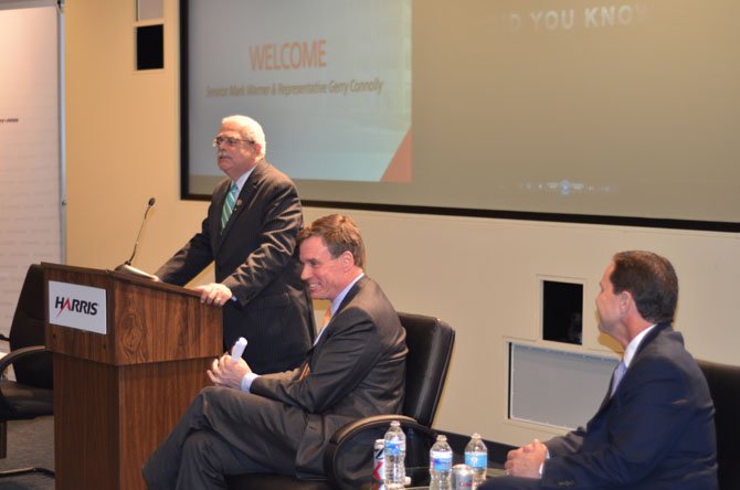 U.S. Rep. Gerry Connolly (D-11) welcomed the staff at Harris Corp. to the Herndon location during the March grand opening ceremony. Seated are U.S. Senator Mark Warner (D-Va.) and Harris Corp. CEO William “Bill” Brown.