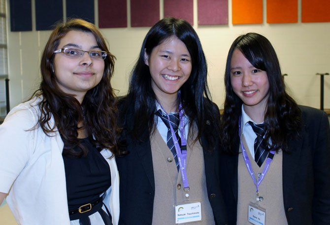 Safiyyah Nadeem, a senior at Lake Braddock Secondary School, poses with Japanese exchange students Natsuki Tsuchimoto and Ayano Ito. Nadeem visited Japan last summer, and this week hosted Tsuchimoto at her house.
