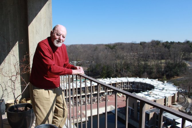 Robert Simon overlooks Washington Plaza at Lake Anne, where Reston’s opening ceremony was held in 1965.