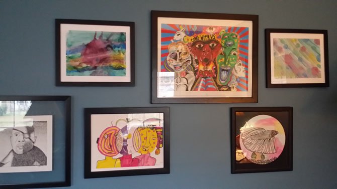 Inexpensive frames are a simple way to display a child’s artwork and help eliminate clutter.