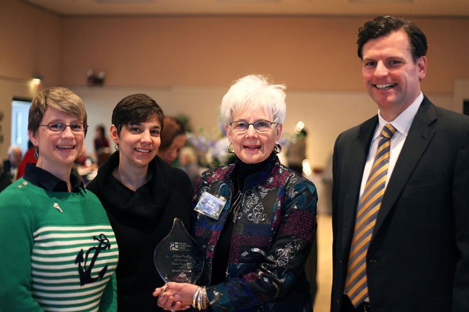 2013 Volunteer Award winner Beverly Howard, with MCC Governing Board Chair Chad Quinn, and her daughters (left to right) Laurie Felton and Karen Sasaki. 