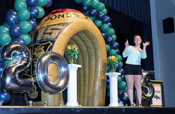 Katie Cummings, the historian for South County High School Class of 2015, celebrates as she receives her class ring during a ceremony on April 8.
