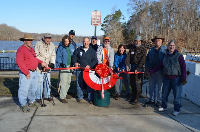 Friends of Lake Accotink Park Staff and volunteers at the ribbon cutting ceremony, Saturday April 5, for the newly installed donation box at the Park's Marina.
