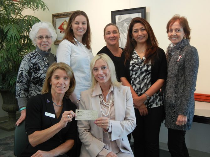 Great Falls Friends and Neighbors (GFFN) presented a check for $4451 to the Artemis House. The money was raised from the sale of White House Christmas ornaments.
From left, standing - Pat Kuehnel, Danielle Colon, (Artemis House), Maria Volpe, Ranjana Chawla, MaryAnn Nocerino;
Seated - Jolie Smith (Artemis House) and Roz Drayer.
