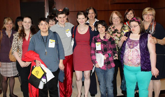 Advocates for Fairfax County special education graduates gather at the public hearing on the budget on April 10.
