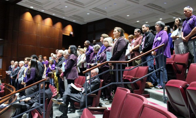 The public hearings on the Fairfax County budget drew a large crowd each day. Here, a group of community members advocate for school funding. 