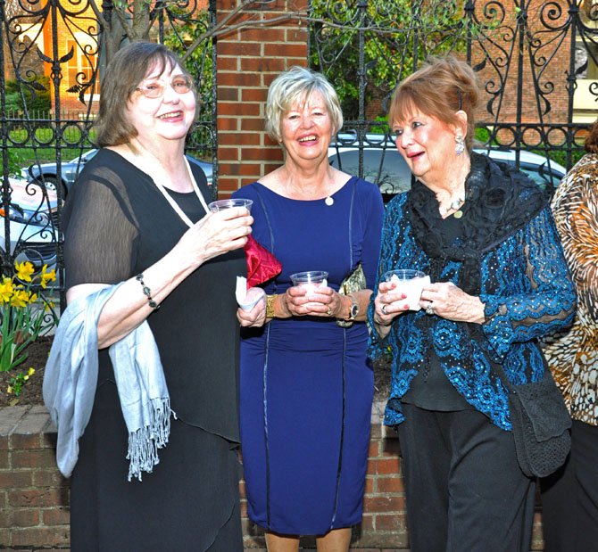 From left, Jean Coyle, Lois Legoske and Nancyann Burton shared a laugh while socializing in the courtyard of LTA.
