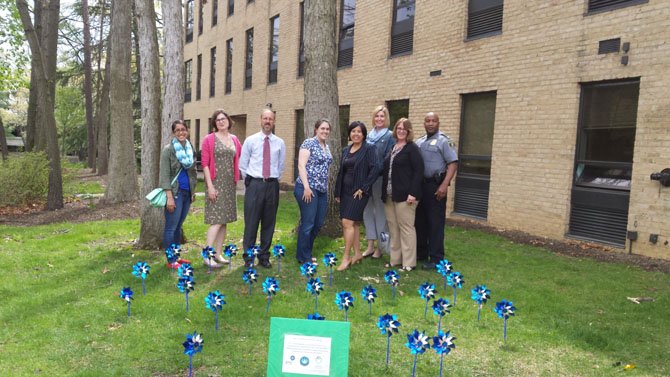 Participants, from left, include Danielle Dutta, CAC intern/volunteer; Tricia Bassing, chief of Child Behavioral Health and Youth Development, DCHS-CCF; William Hauda, medical director, Inova FACT Department, Inova Hospital; Susan Britton, CAC program director; Giselle Pelaez, Center executive director; Jennifer Cann, CPS program manager, DCHS; Peggy Stypula, CATCH cCoordinator-DCHS, and Lt. Tony Brown, Alexandria Police Department.
