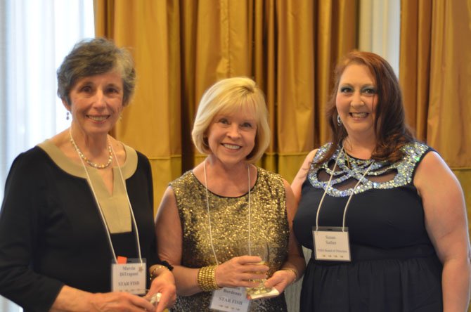 Herndon-Reston FISH volunteers Marcia Di Trapani and JoAnn Bordeaux were recognized for their work with FISH at the Annual Fish Fling held at Crowne Plaza Dulles Airport Hotel on Saturday, April 26. With them is Susan Sather, a FISH community board member.
