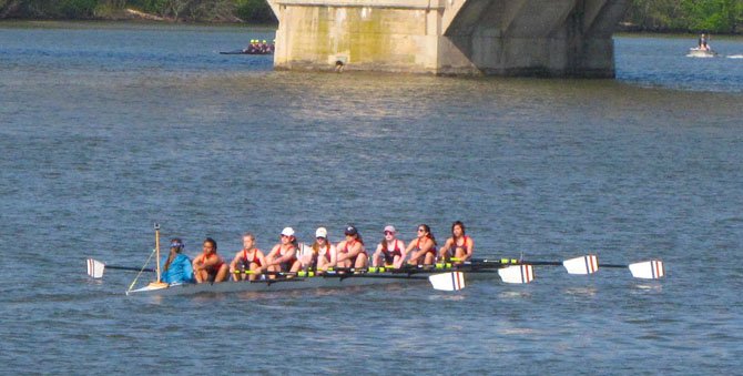 The T.C. Williams Girls Freshman Eight compete in a preliminary heat at the Charlie Butt Regatta April 26 on the Potomac River. The Alexandria Crew Boosters will host a fundraiser May 2 at the Old Dominion Boat Club to benefit the T.C. rowing program.
