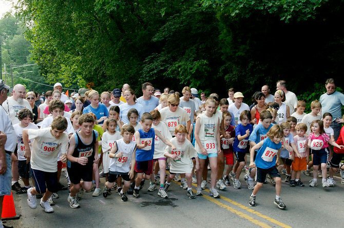 Participants of last year’s Clifton Caboose Twilight Run get ready for the one-mile fun run. This year’s event is May 17 at 6 p.m.