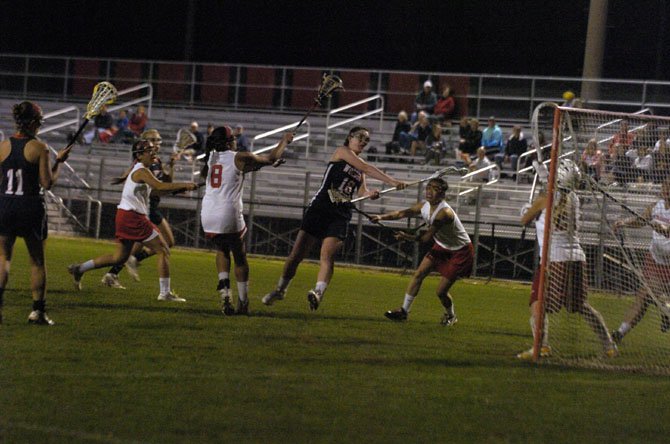 Woodson junior Isabel Obregon scored eight goals during the Cavaliers’ 18-8 victory over Annandale on Tuesday.