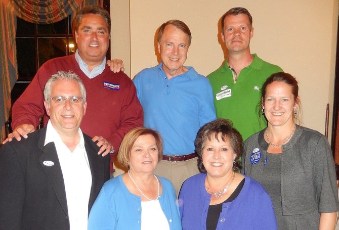 Fairfax Mayor and City Council photographed after election Tuesday night: (Back row, from left) Scott Silverthorne, David Meyer and Jeff Greenfield, and (front row, from left) Michael DeMarco, Janice Miller, Ellie Schmidt and Nancy Loftus.
