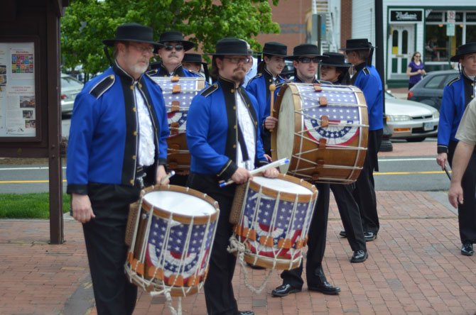 Members of the American Originals Fife and Drum Corps played in front of the Herndon Depot Station on Saturday, May 10 at noon. This show was to kickoff a fundraiser event sponsored by Potter’s Fire.
