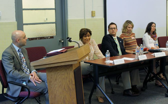 Stuart White, Deborah Tyler, Alexander Case, Theresa Carhart and Teresa Chapman talk about Fairfax County Public Schools at the NEXUS forum on building strong health outcomes for children and youth on May 9 at the Virginia Hills Center in Rose Hill.
