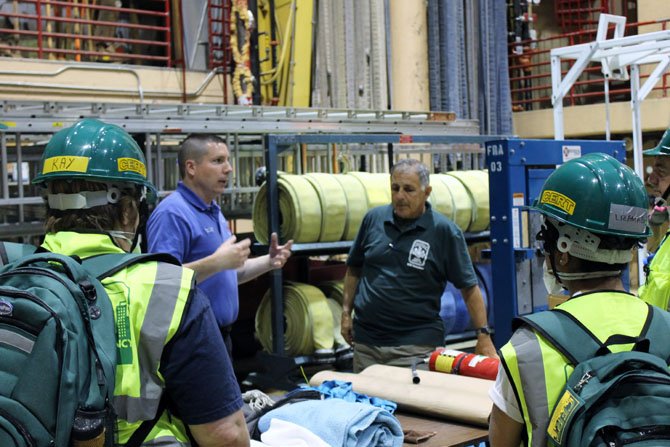 CERT teachers include members of the Fairfax County Fire and Rescue who are experienced in emergency response. Here, instructors guide a group of students at a CERT class on May 12.
