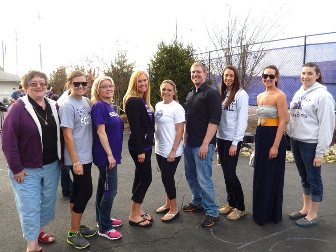 From left are Chantilly Yearbook Advisor Mary Kay Downes; Sarah DeCenzo, Class of 2009; Stacey Schweppe, 1986; Lisa Comerford, 2009; Carmen Wise, 1994; Shawn Heilemann, 2001; Lauren Gural, 2008; Kate Argy, 2004, and Emma Lawson, 2008. 
