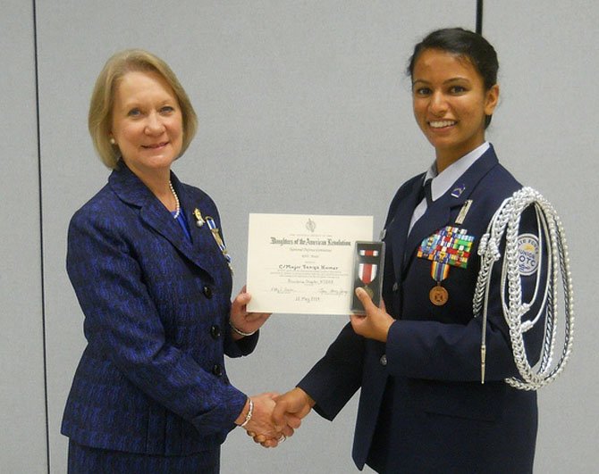 Marsha Price, of Providence Chapter, Daughters of the American Revolution, with Tanya Kumar.
