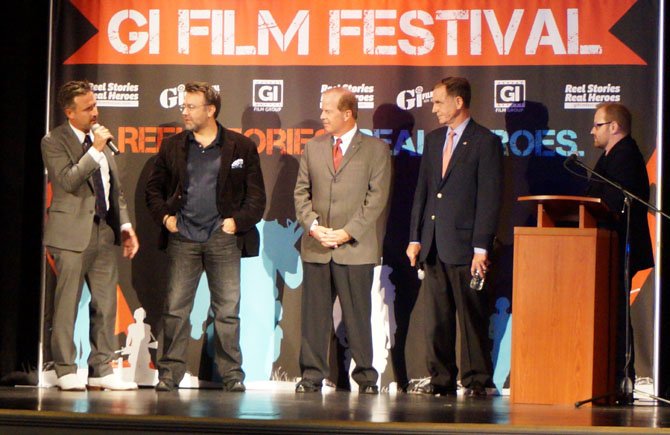 Actor David Arquette, left, talks about his role in “Field of Lost Shoes” at the film’s May 19 premiere at the Old Town Theatre during the opening night reception for the 2014 GI Film Festival. With Arquette are executive producer Brandon Hogan, screenwriters and former University of Virginia classmates David Kennedy and Thomas Farrell and film festival co-founder Brandon Millet.
