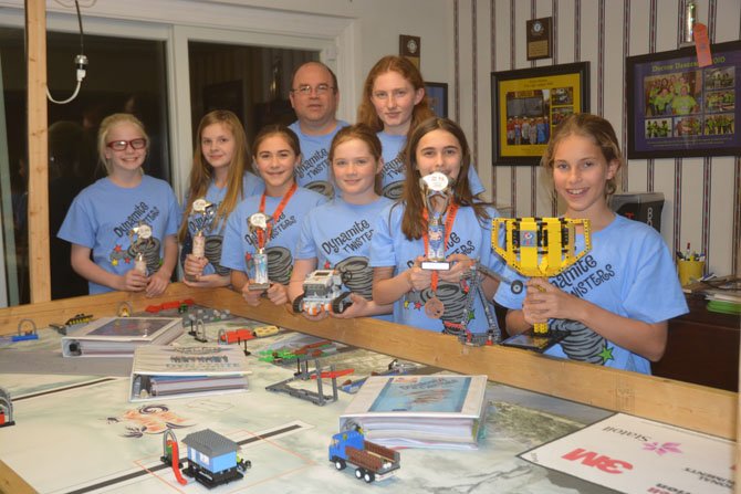 The Dynamite Twisters, front, from left, include Sofie Drexler, Jessica Lopez, Leslie Lytle, Abigail Henshaw, Nicole Bires, Claire Fergusson, in back, coaches Bob Henshaw and Katie Henshaw 
