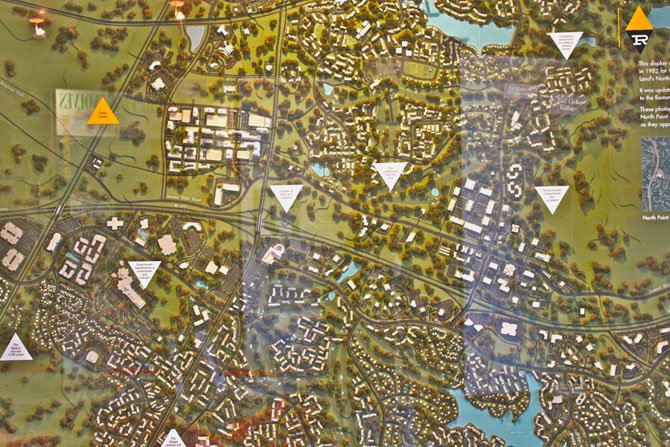 Aerial 3-D map of Reston at the Lake Anne museum .
