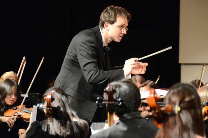 Dr. Scott McCormick conducts the Langley HS Orchestra. 