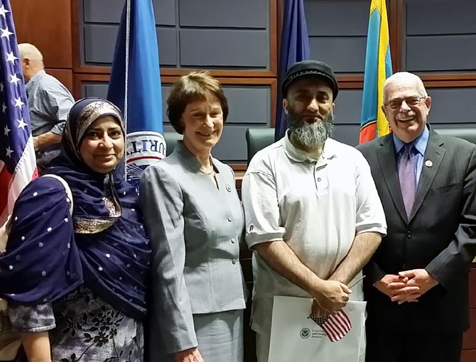 Jaheda Guliwala, Board of Supervisors Chairman Sharon Bulova, Hanif Guliwala, and U.S. Rep. Gerry Connolly (D-11) celebrate Hanif’s new American citizenship after a naturalization ceremony at the Fairfax County Government Center on May 23.
