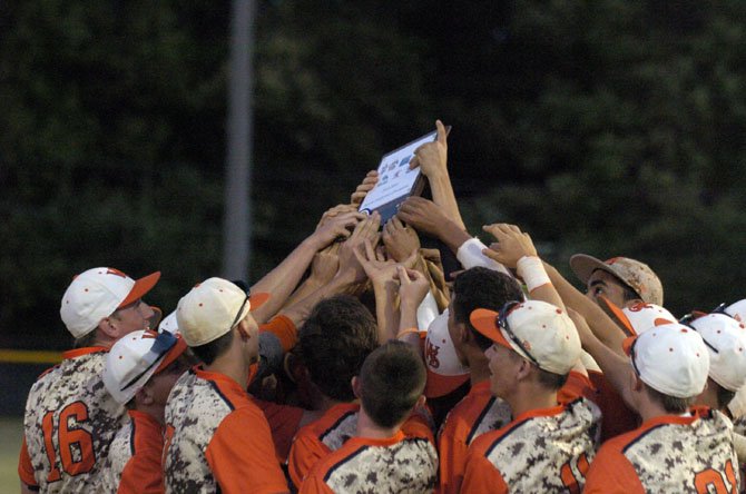 The West Springfield baseball team celebrates winning the Conference 7 tournament on May 23.