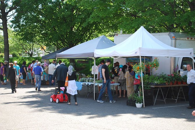 Community members shop at the grand opening of the Tysons Smart Markets Farmers’ Market Sunday, June 1.