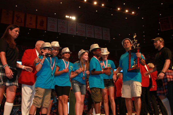 Seventh grade Nysmith Odyssey of the Mind team won the third place trophy in the World Finals in Ames, Iowa. 