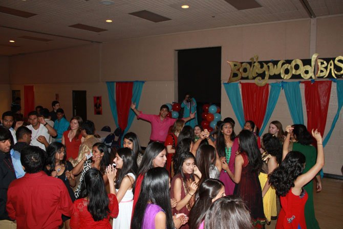 Students dance Bhangra during Bollywood Bash on Saturday.