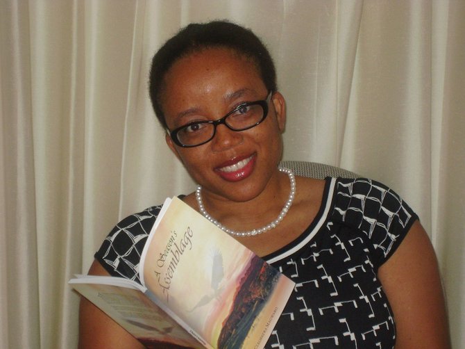 Cleo Magwaro with her book, "A Season’s Assemblage."