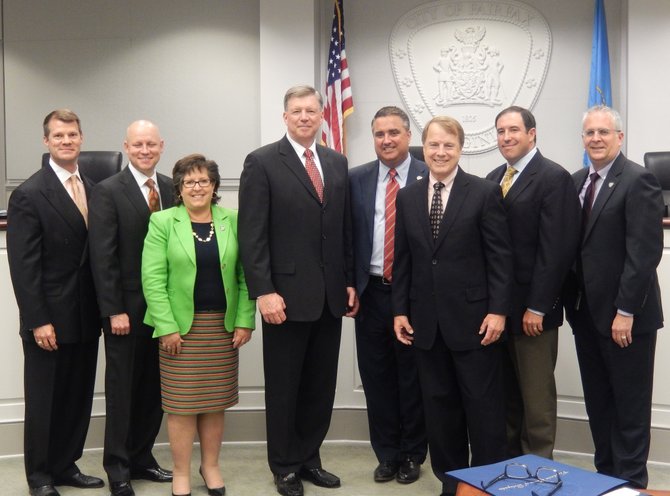 City Council and the chief: (From left) are Jeff Greenfield, Steve Stombres, Ellie Schmidt, Rick Rappoport, Mayor Scott Silverthorne, David Meyer, Dan Drummond and Michael De Marco.